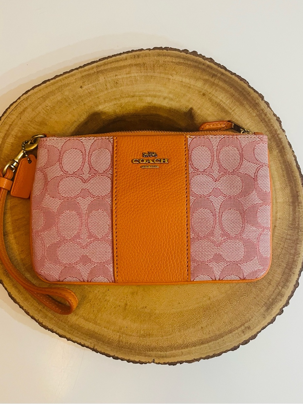 Coach Pink and Orange Signature Wristlet with Center Leather Panel